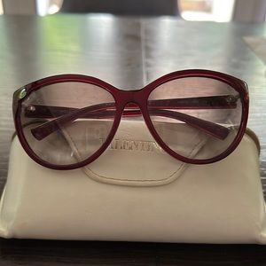 Red Valentino sunglasses. Like new! Case shows some signs of wear.